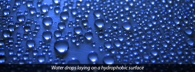 water drops laying on a hydrophobic surface